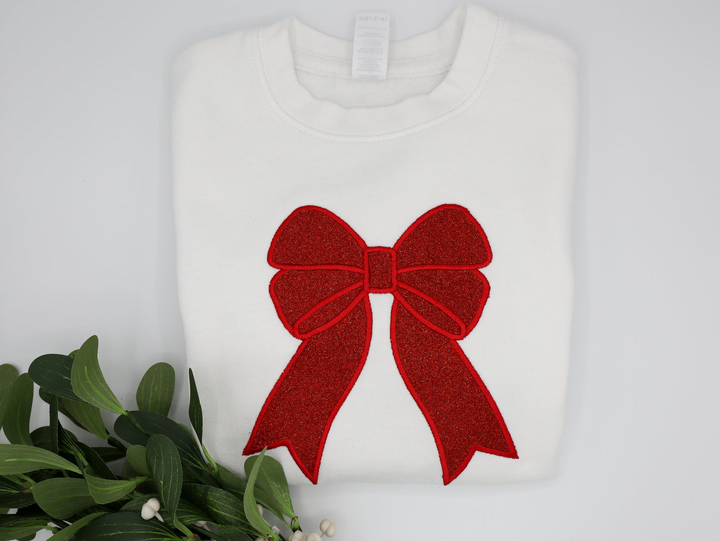 Vinyl glitter bow embroidered sweater