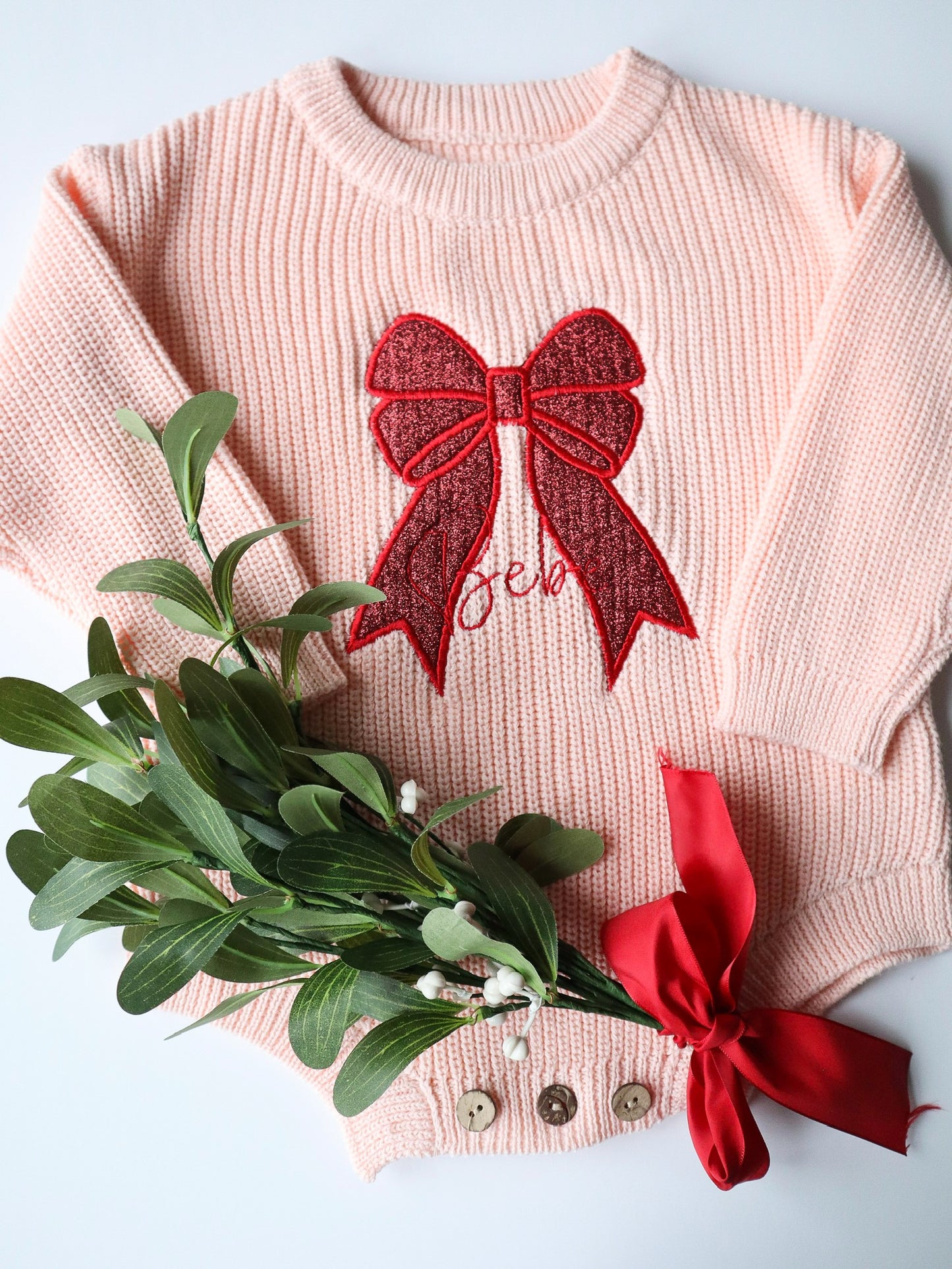Knit Romper with glitter bow made from vinyl and embroidery, personalised with little ones name