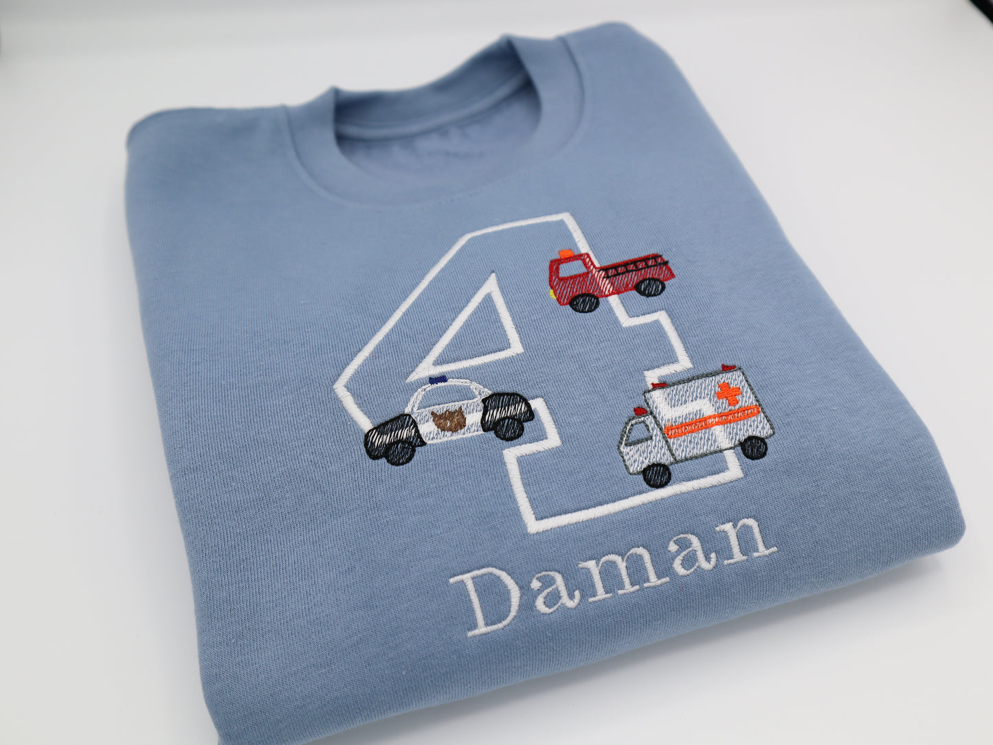 Emergency Vehicle themed birthday embroidered personalised kids sweater
