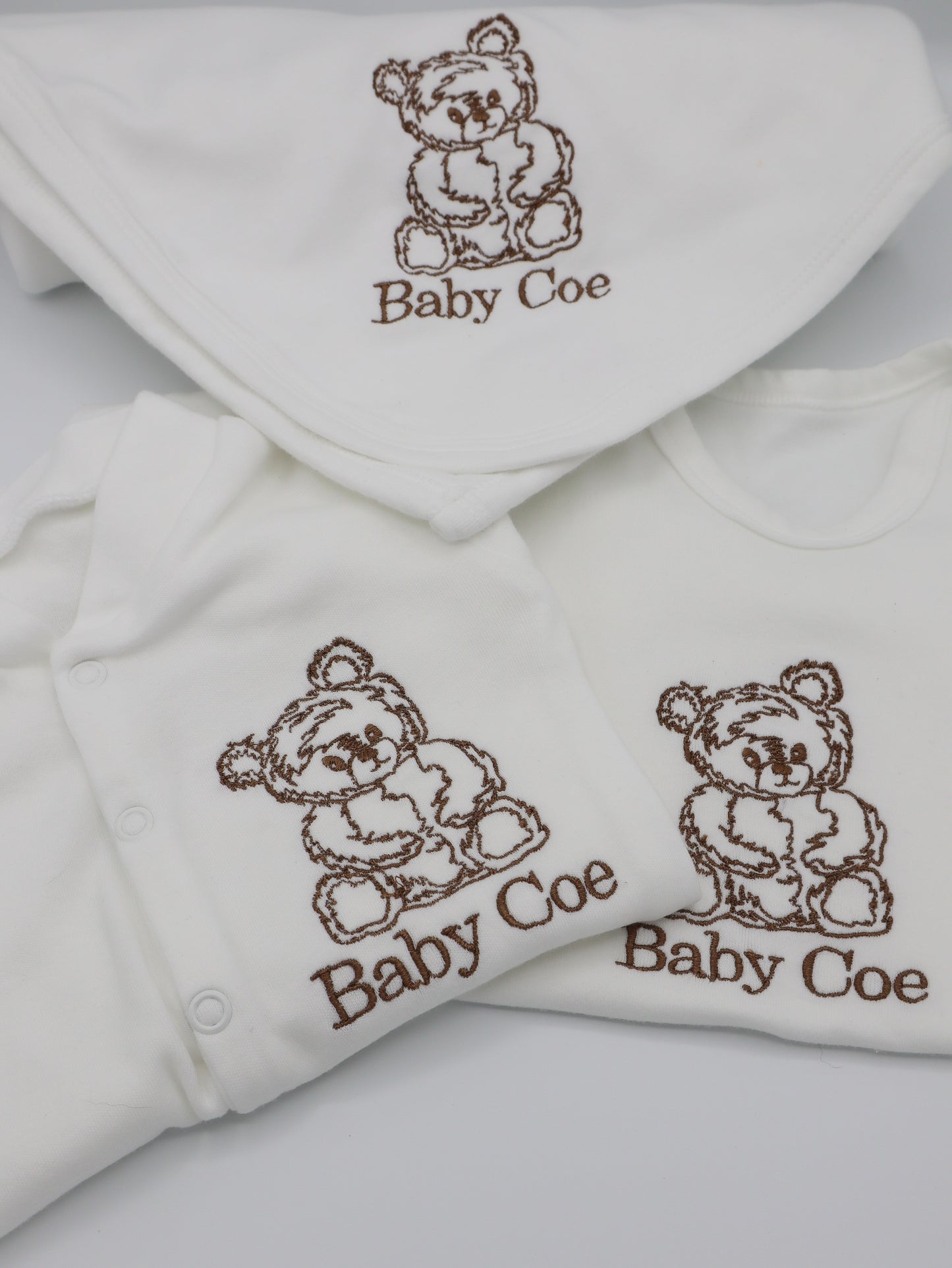 Teddy bear baby personalised embroidered baby gift with a sleepsuit, baby vest and blanket