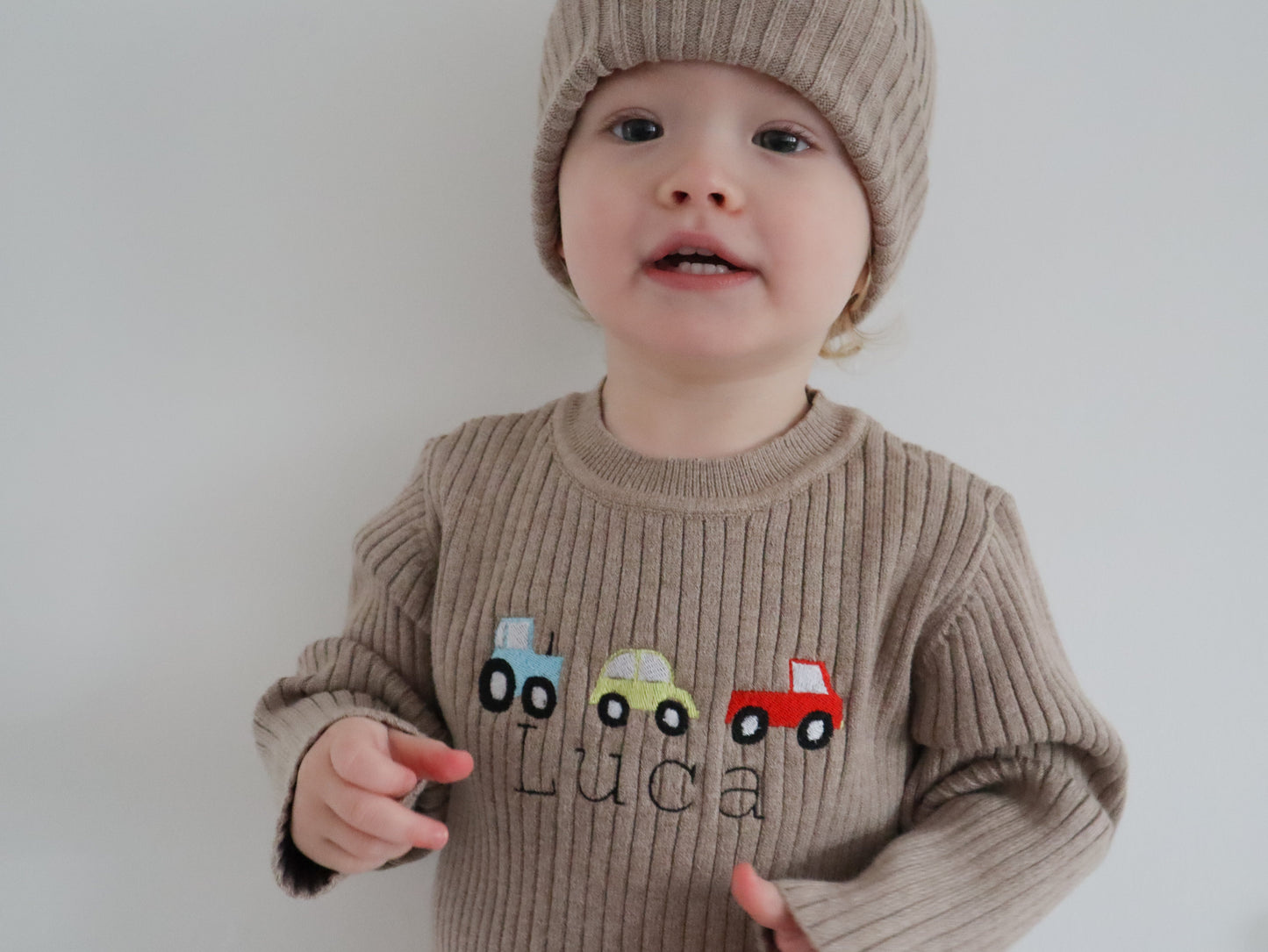 Toddler wearing a Car themed knit outfit set