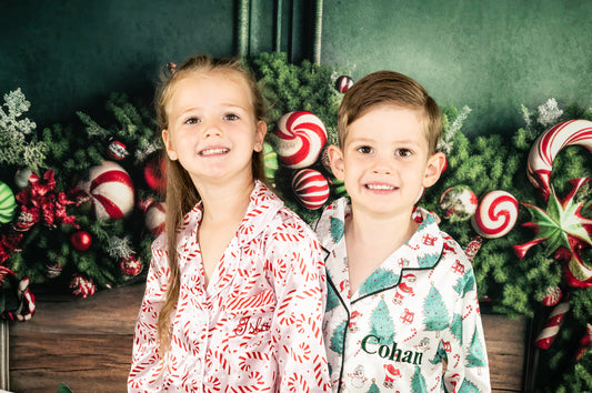 Girls satin feel candy cane themed personalised embroidered pink and red pjs