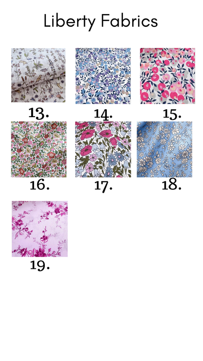 Collection of Liberty Fabrics with various patterns on a white background
