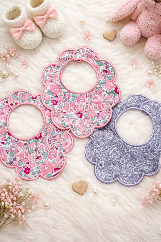 Floral Liberty of london baby bibs with embroidered names