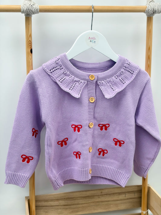 Lilac bow knit cardigan with red embroidered bows
